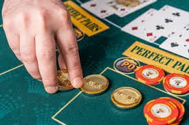Live dealer studio with multiple cameras broadcasting blackjack and roulette tables